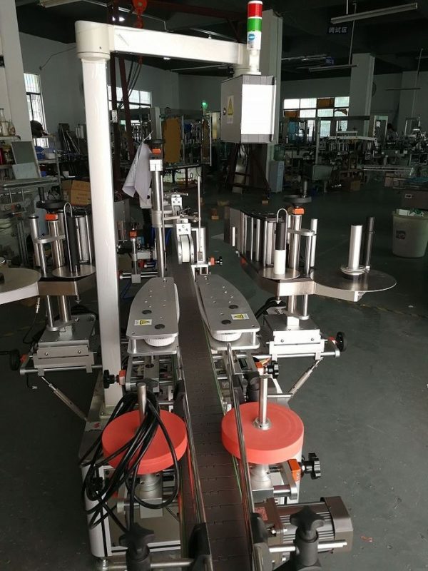 Etiquetadora automàtica d’adhesius de doble cara per a ampolles ovals i planes de xampú